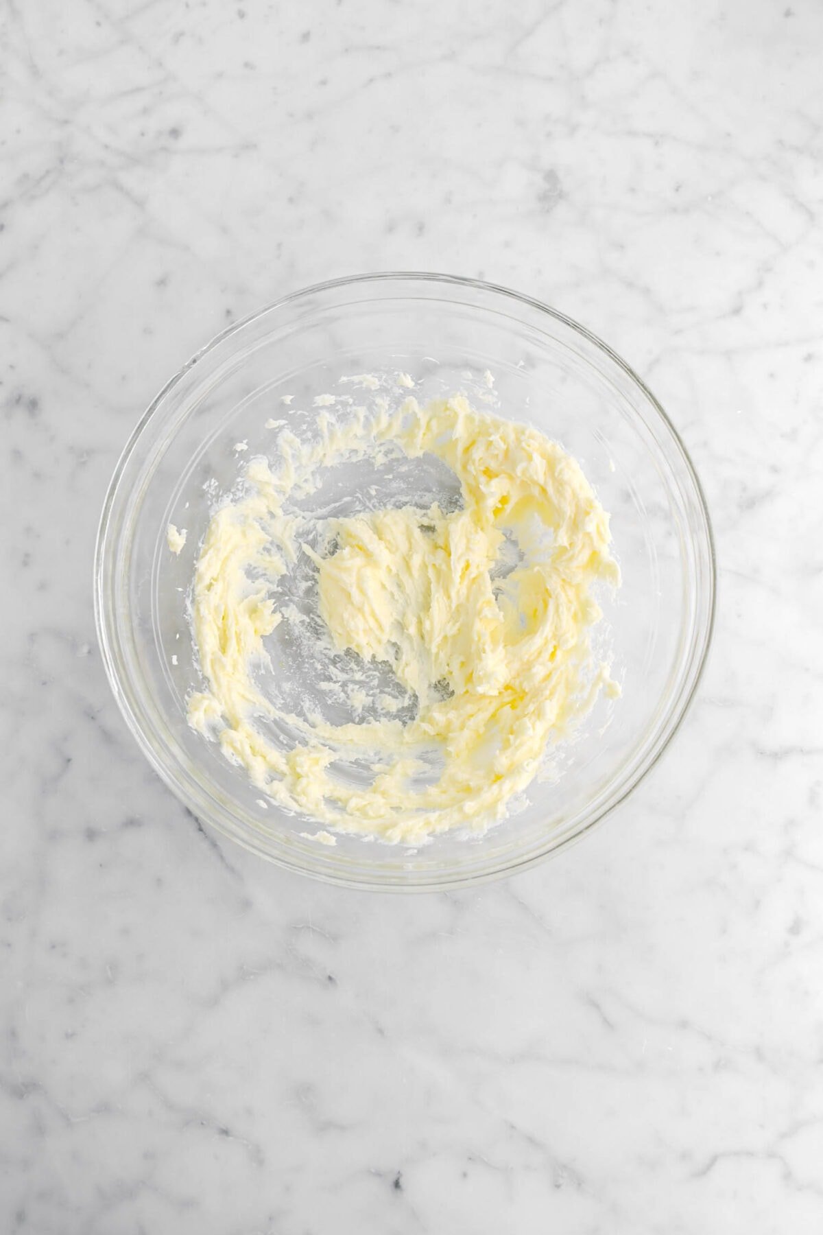creamed butter and sugar in glass bowl.