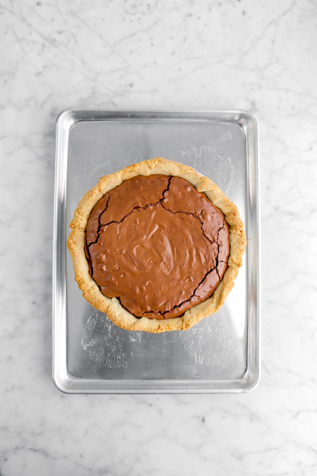 brownie pie on metal sheet pan.