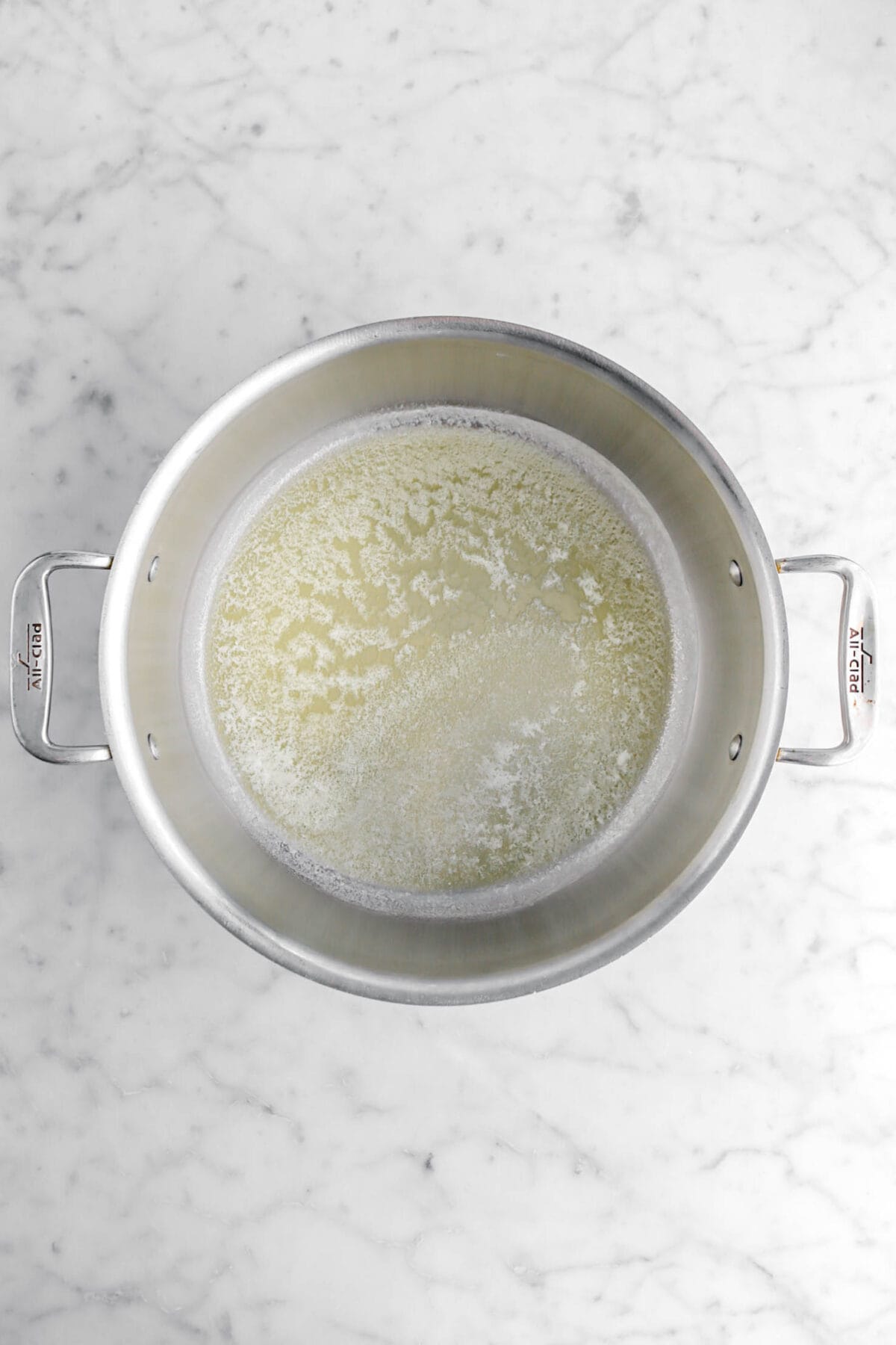 melted butter in stand mixer.