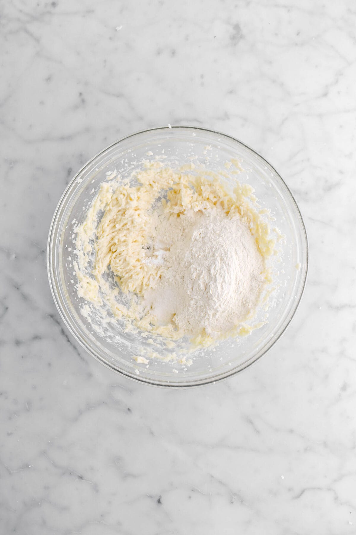 flour, baking powder, and salt added to butter mixture.