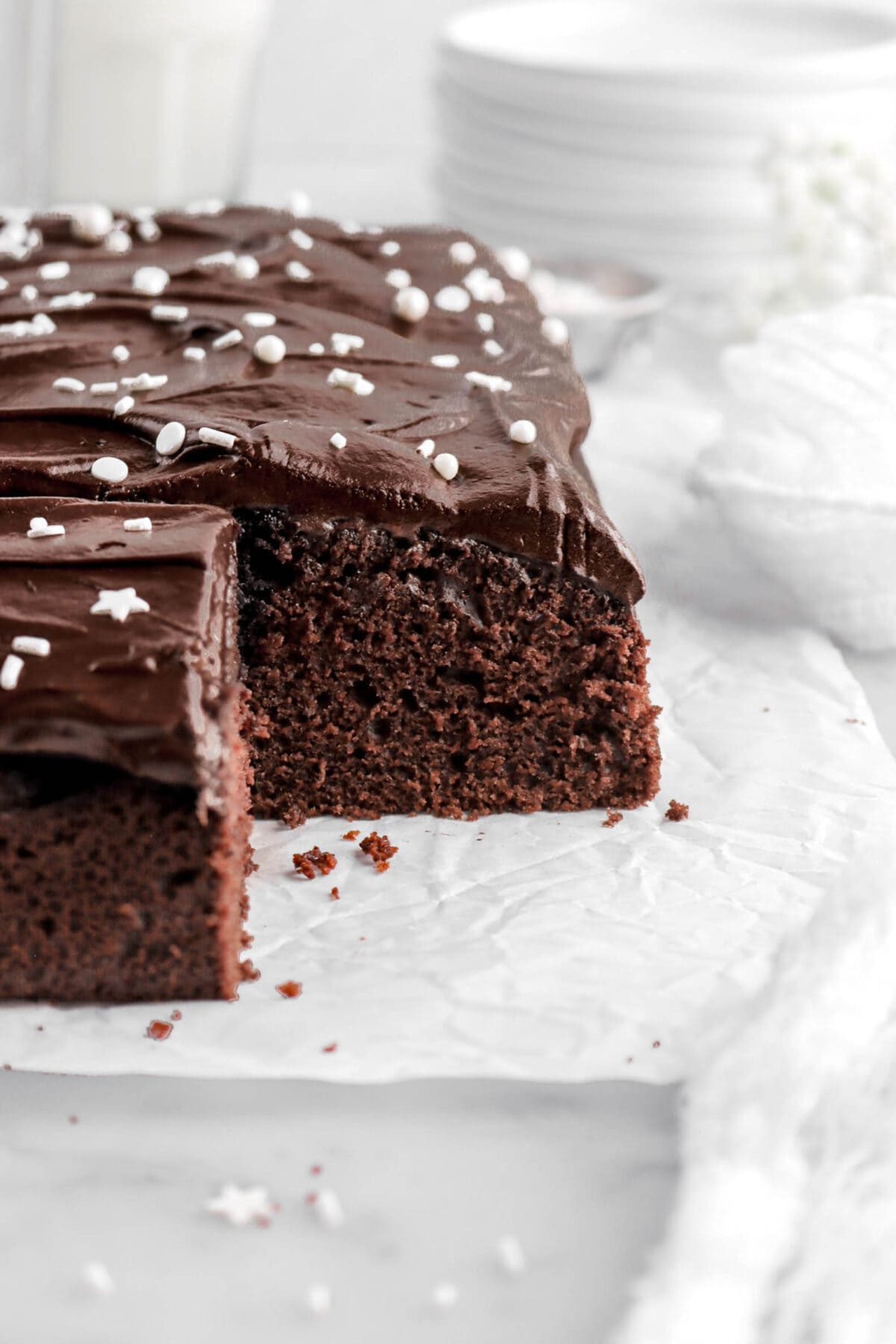 close up of cut chocolate sheet cake.