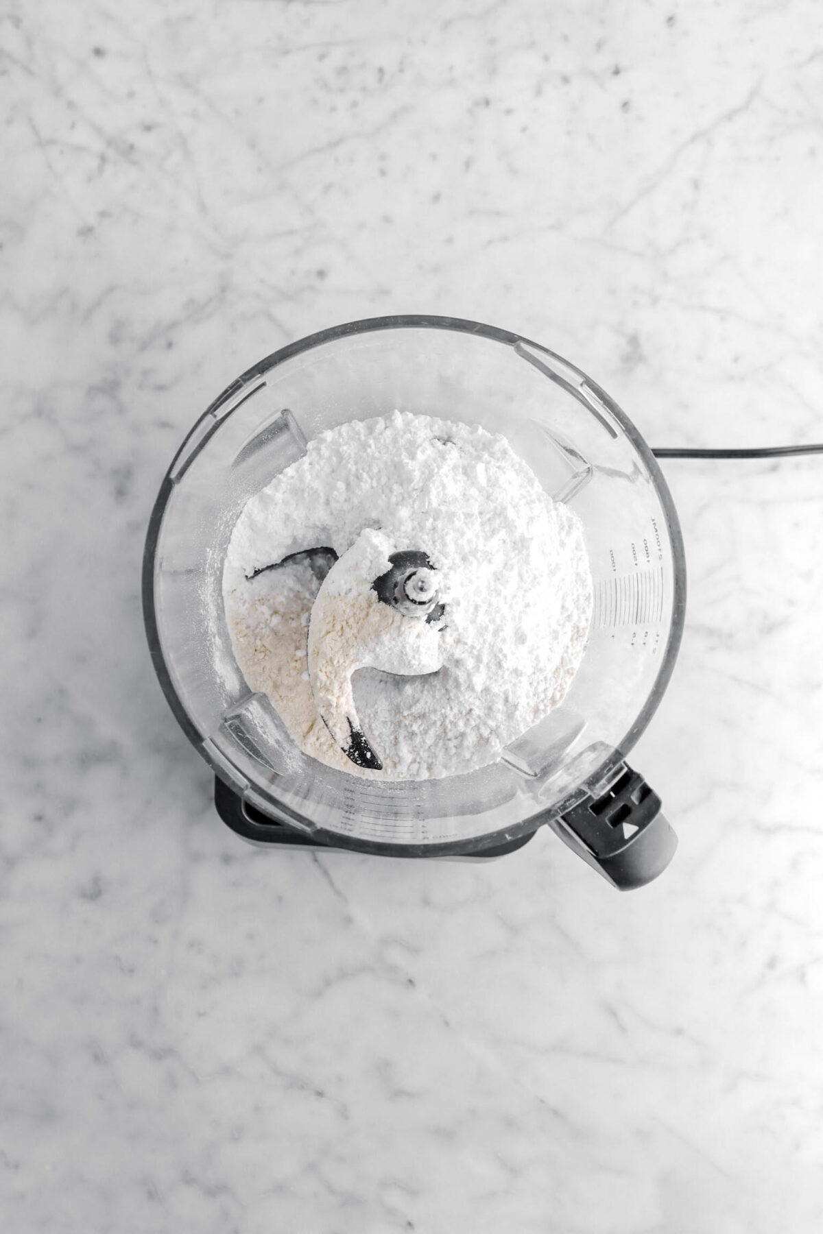 powdered sugar and flour in food processor.