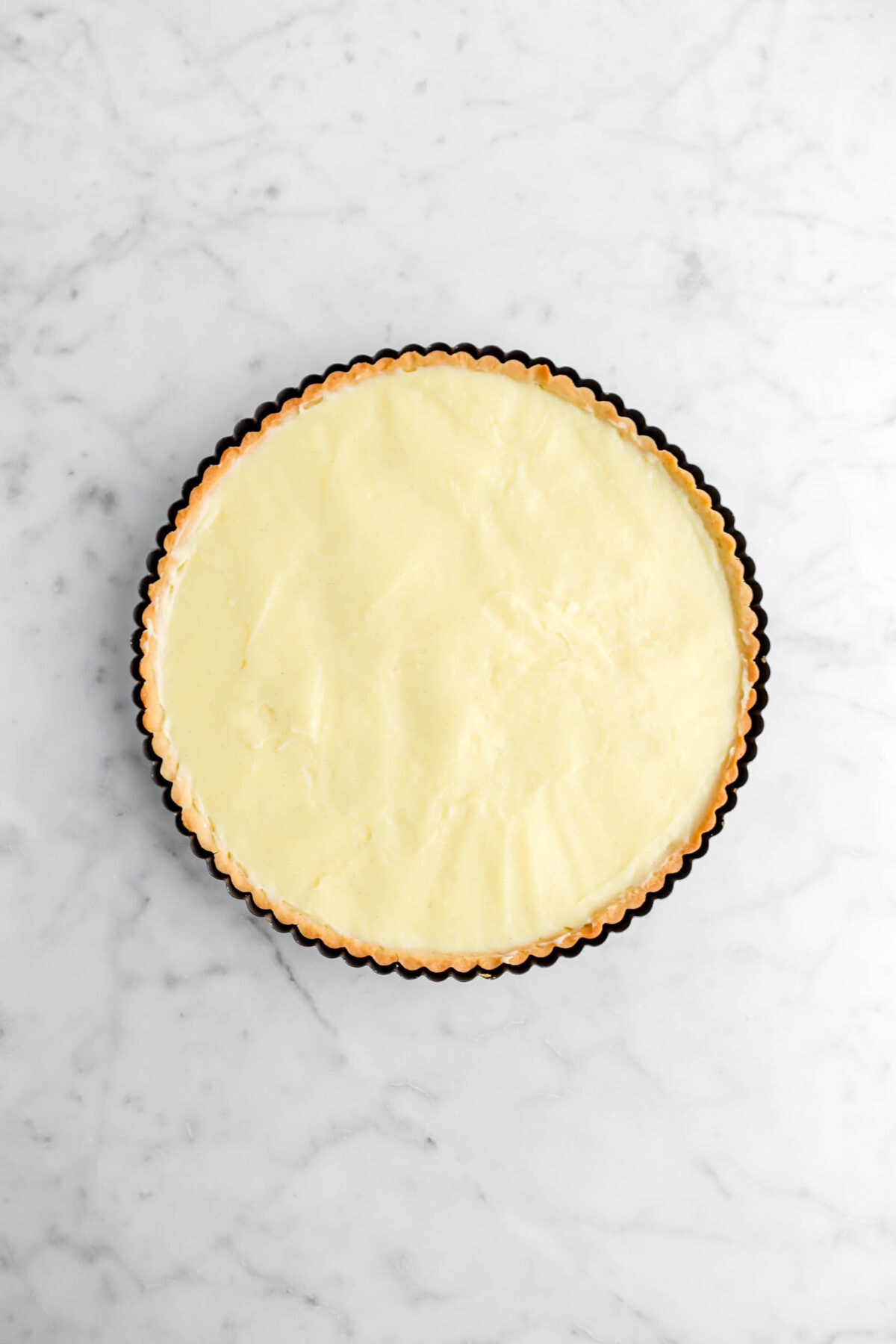 vanilla custard in baked tart shell.