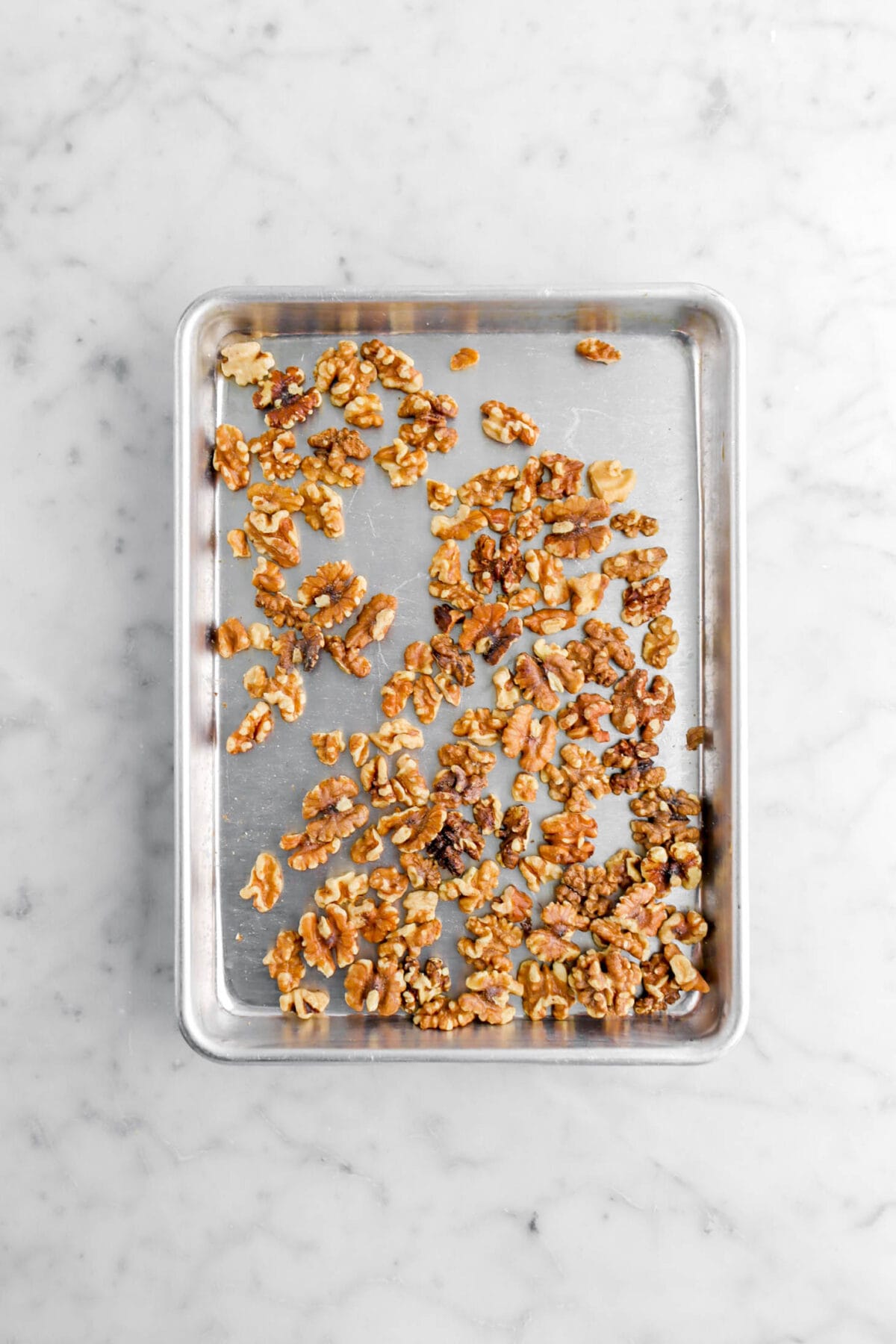 toasted walnuts in sheet pan.