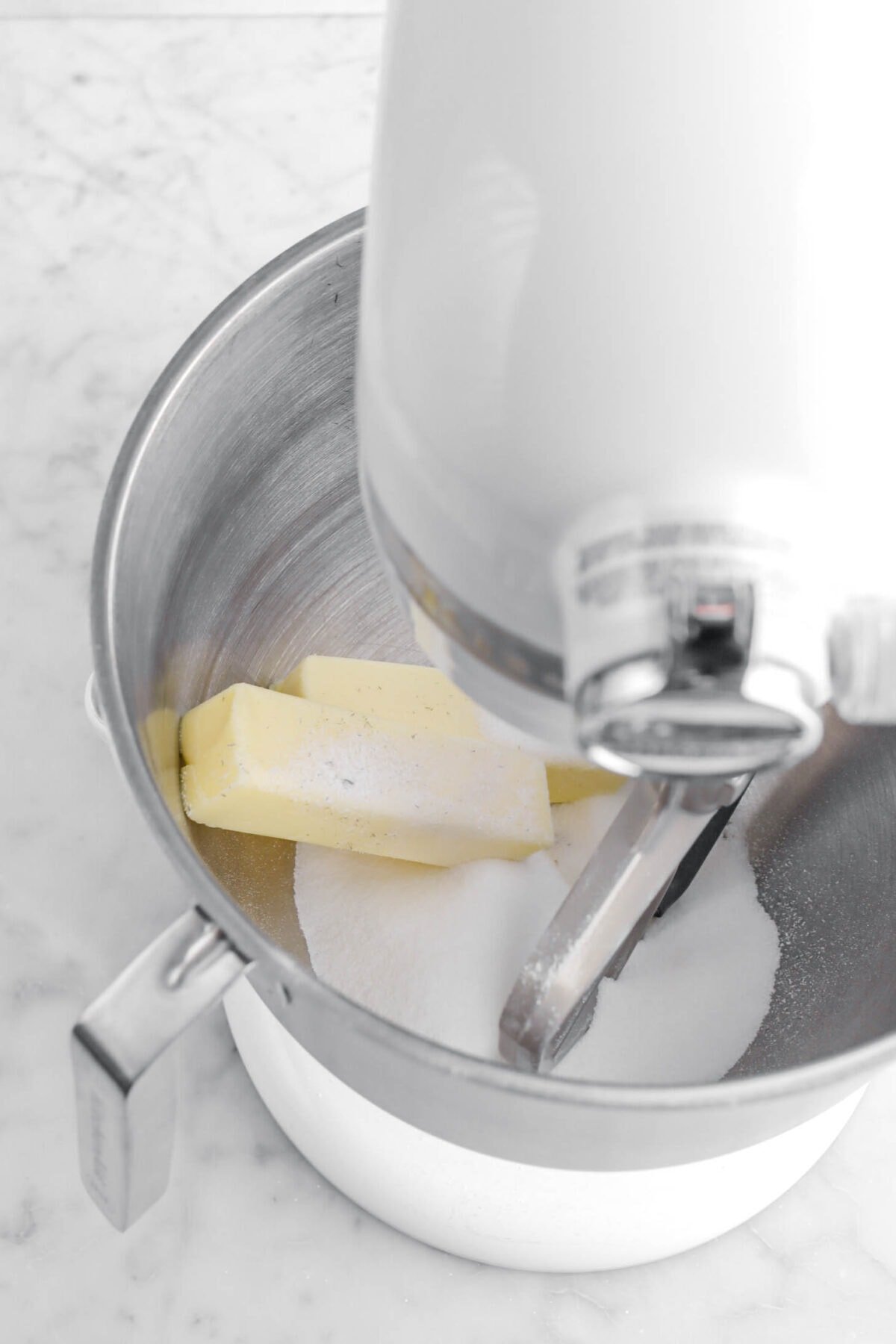 butter and sugar in stand mixer.
