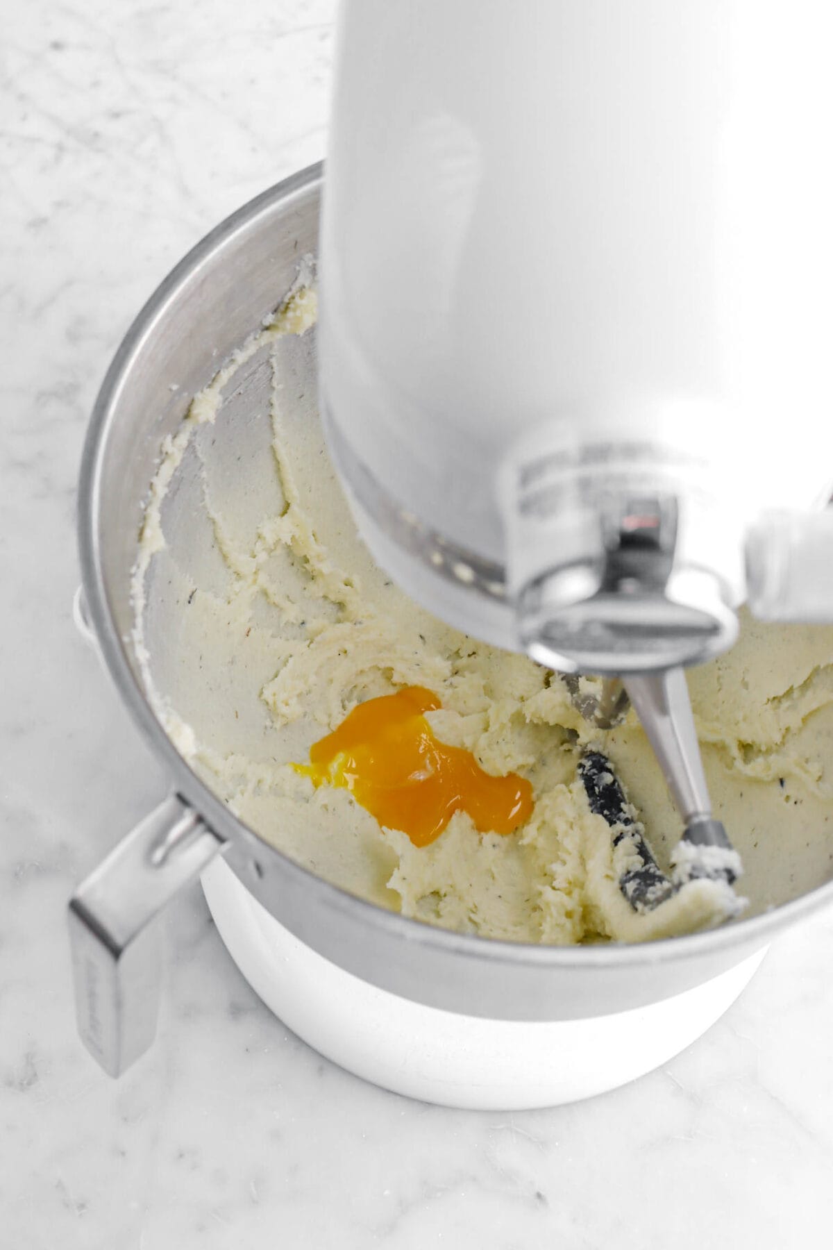 egg yolk added to butter and sugar mixture.