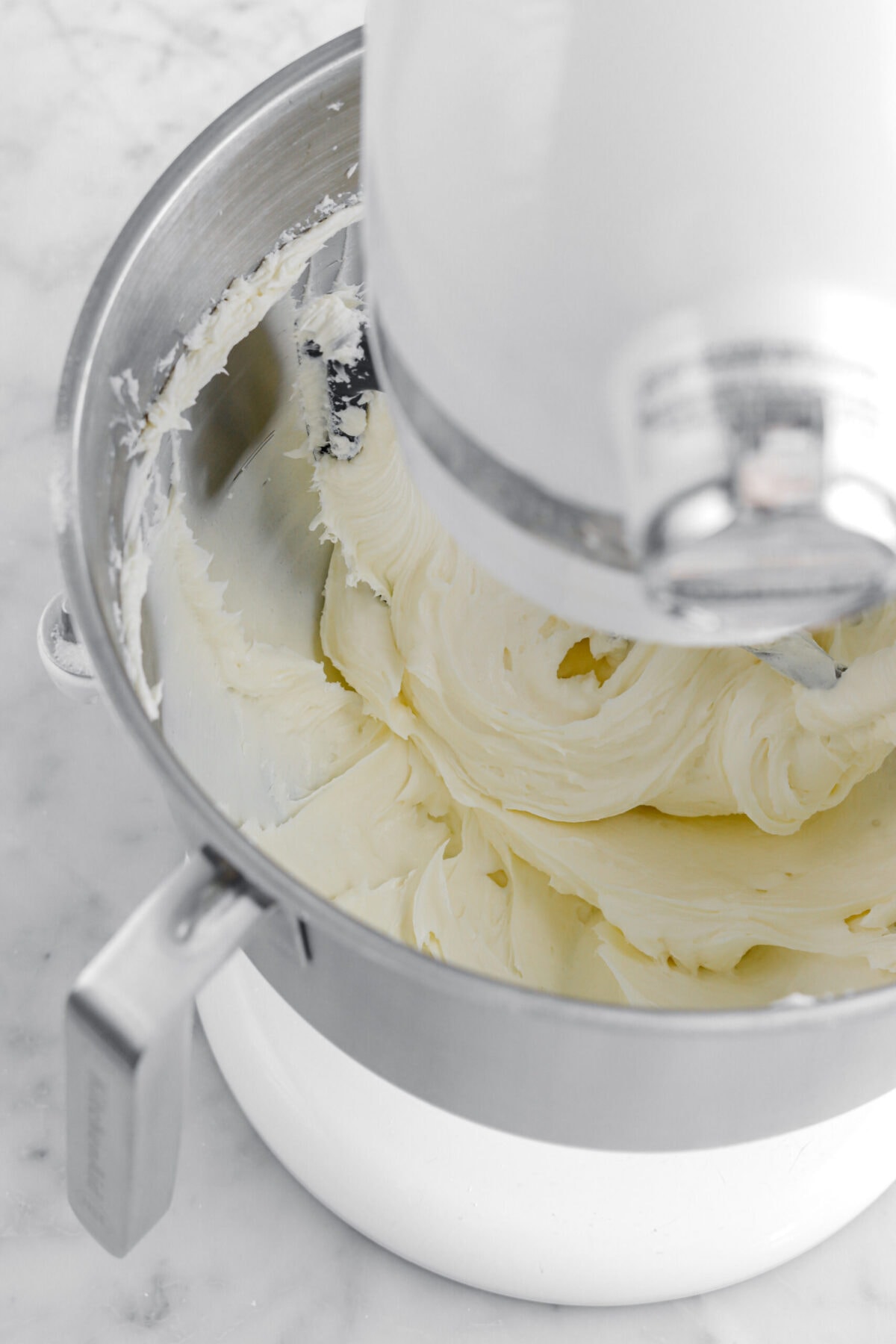 sugar and cream cheese mixture in stand mixer.