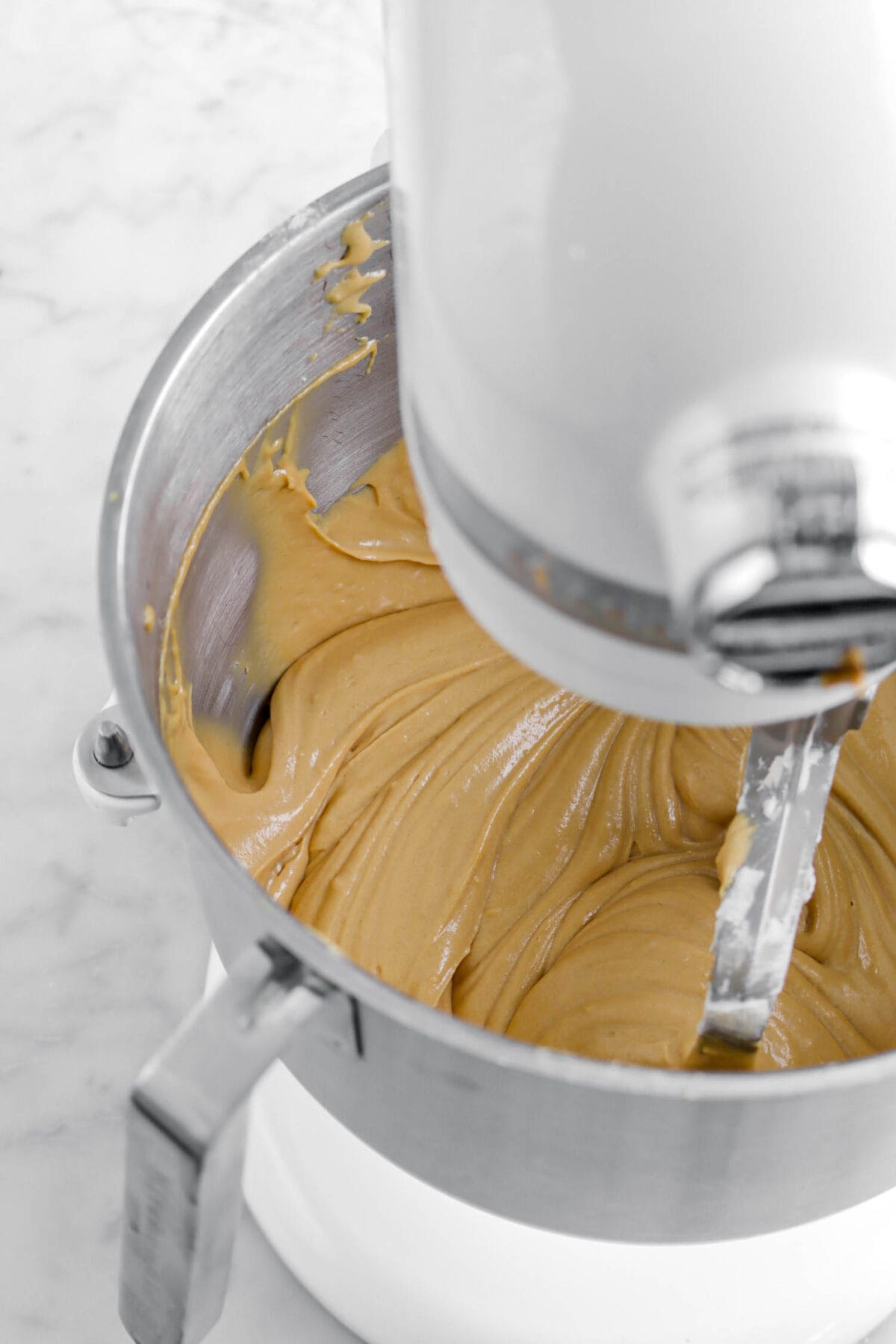 cookie butter cake batter in stand mixer.