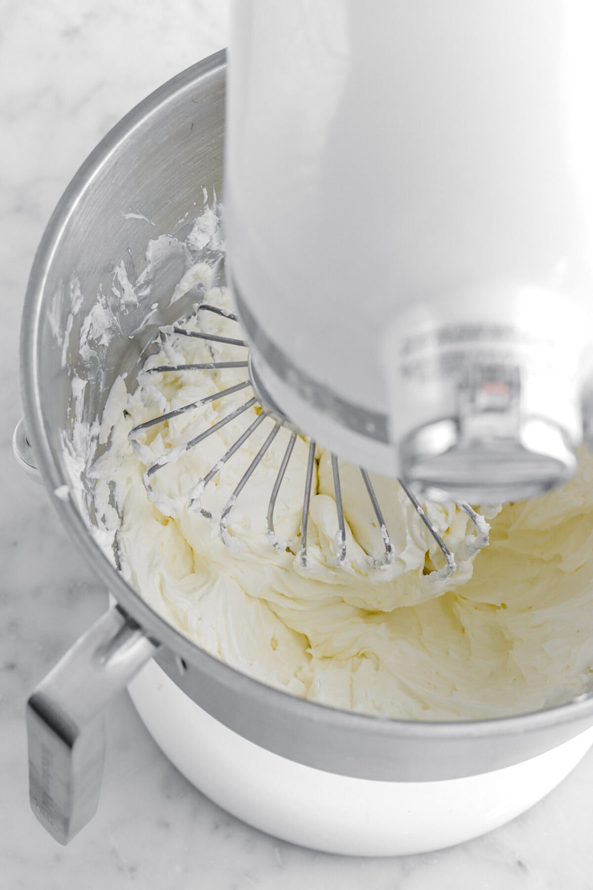 cream cheese and whipped cream mixture in stand mixer.