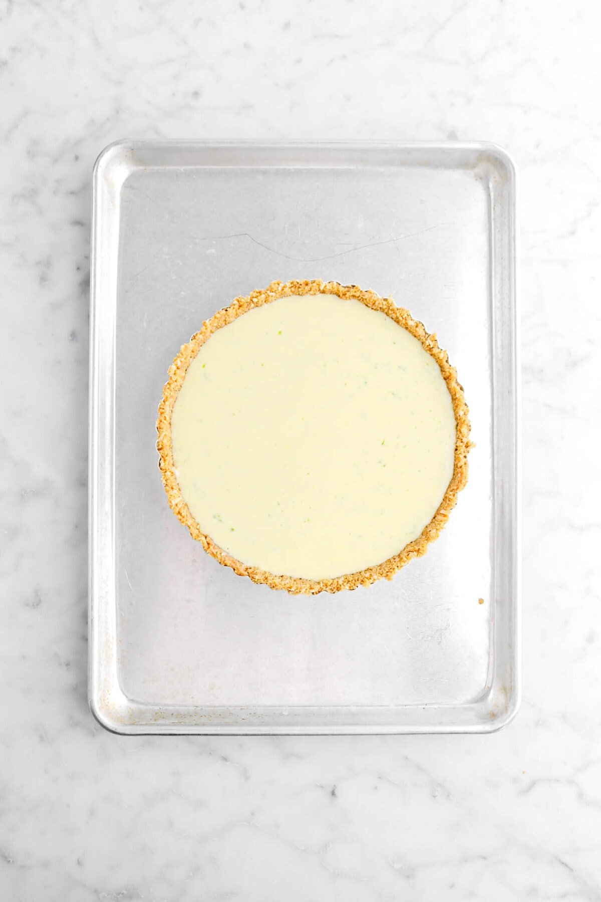 unbaked key lime pie on sheet pan.