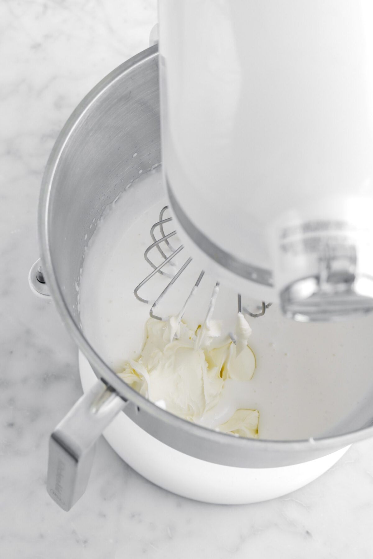 whipped cream and mascarpone in stand mixer.