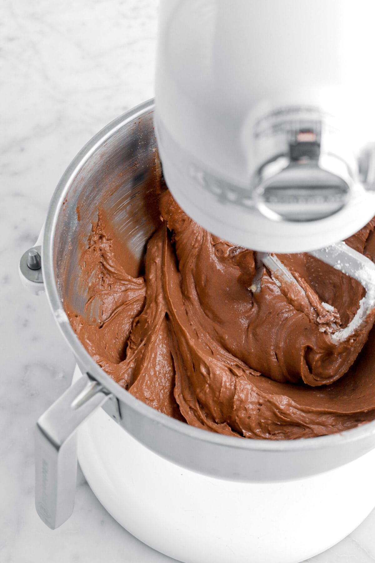 chocolate cake batter in stand mixer.
