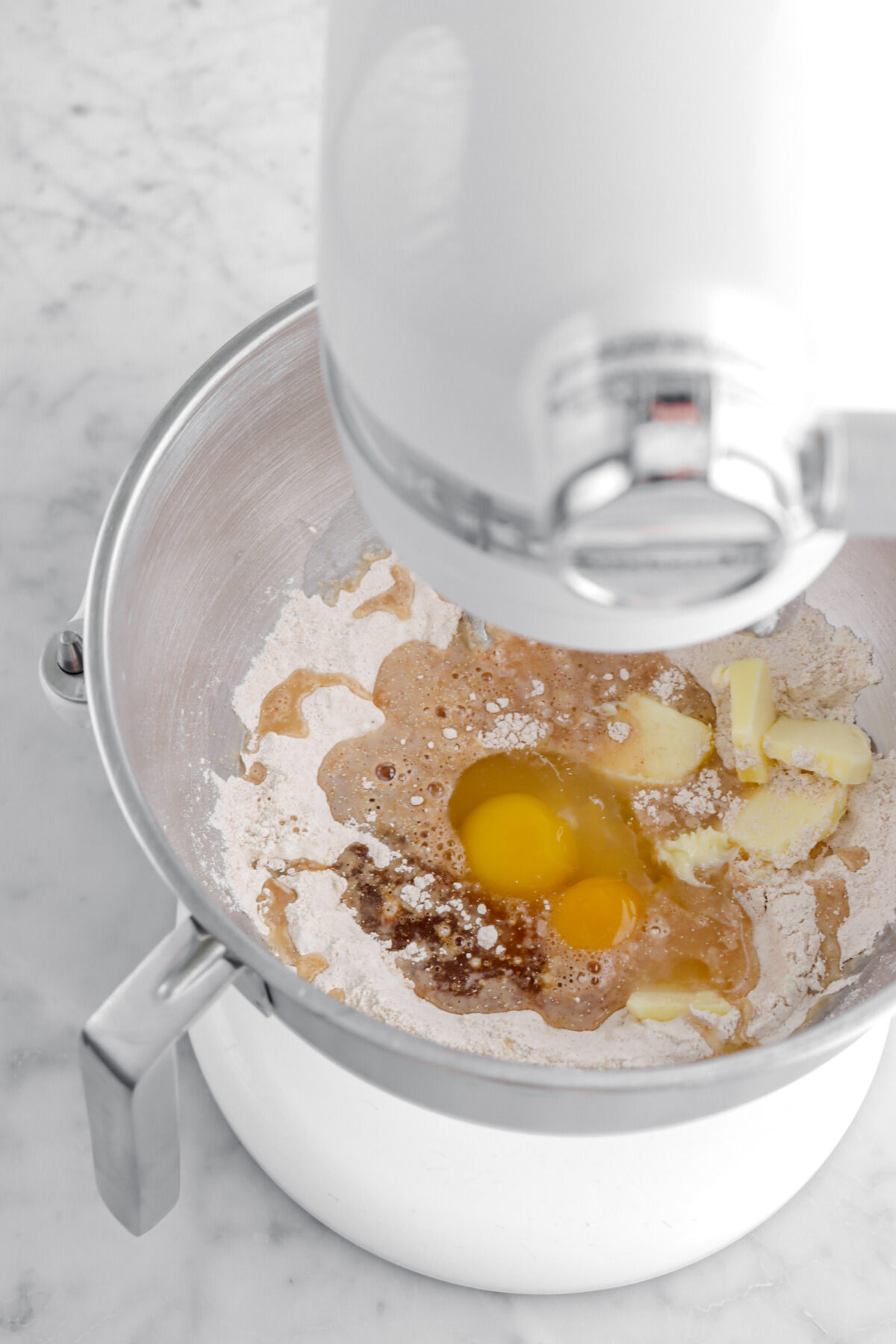 eggs, butter, vanilla, and apple cider added to dry ingredients.