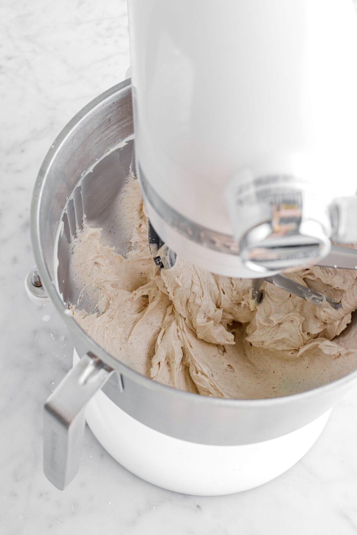 spiced buttercream in stand mixer.