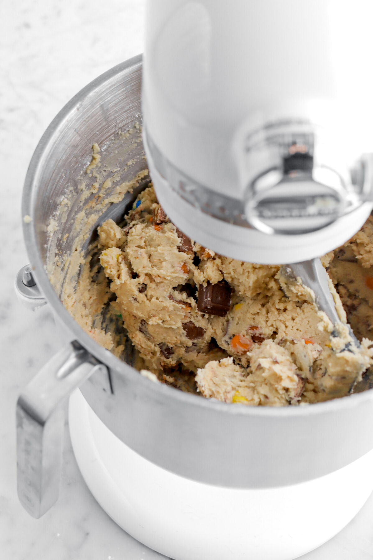 candy cookie dough in stand mixer.