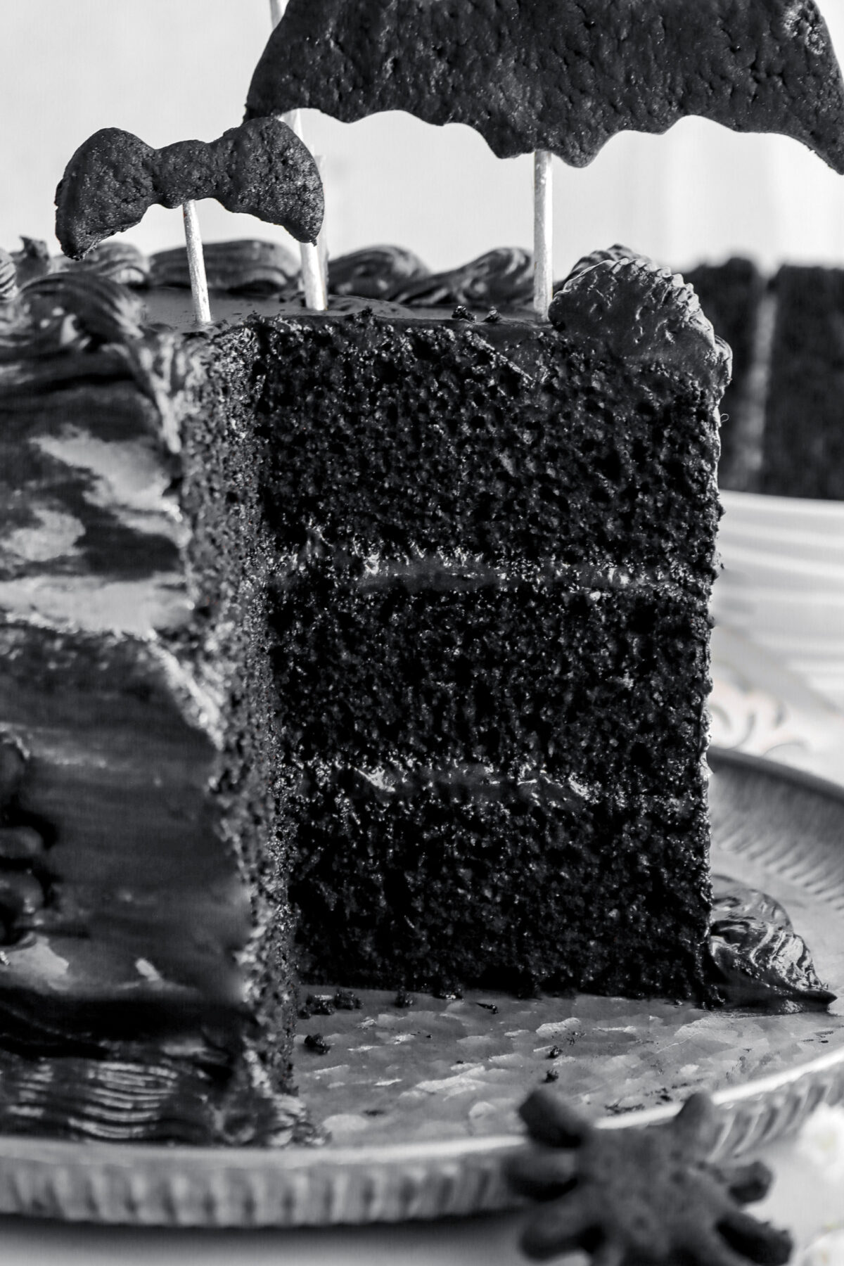 close up of sliced black velvet cake.