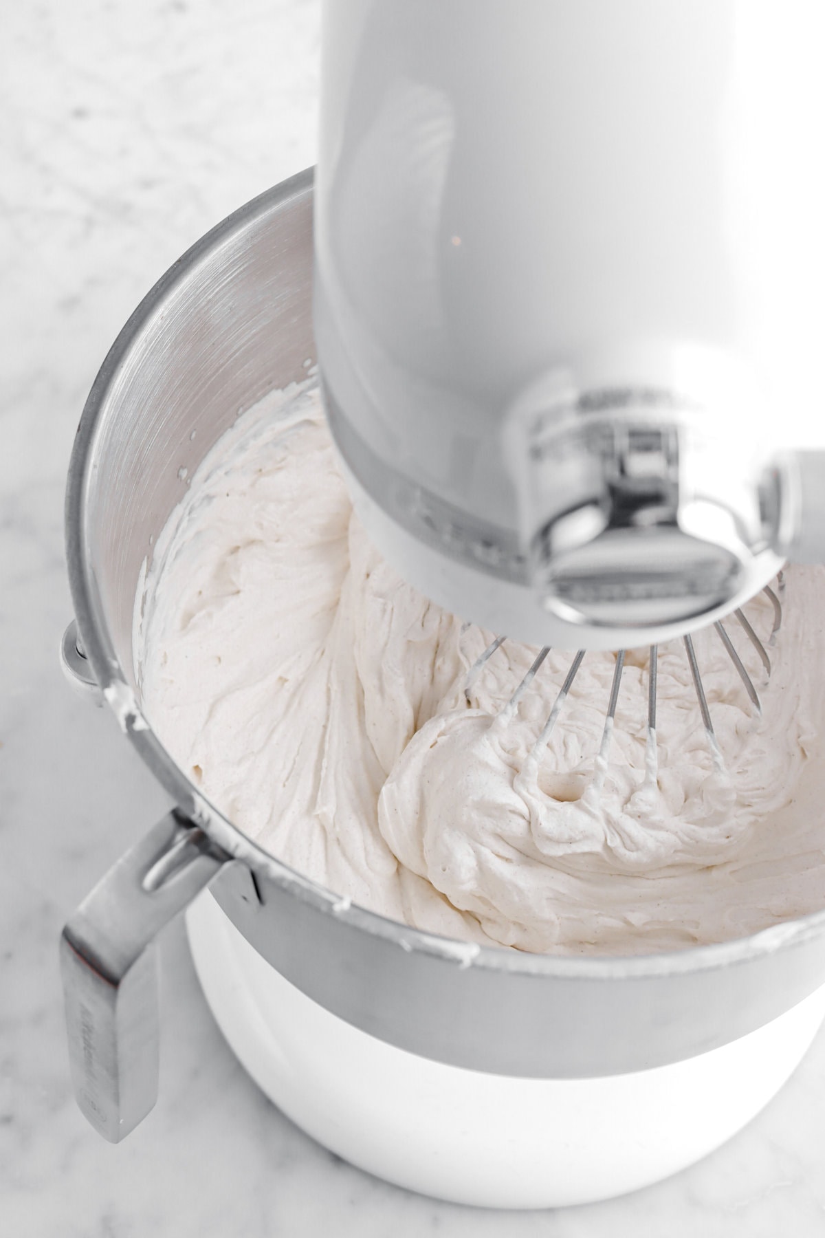 spiced whipped cream in stand mixer.