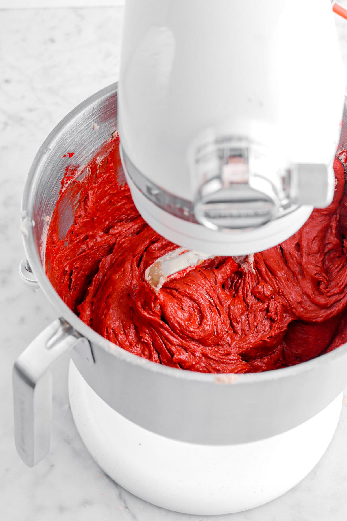 red velvet cake batter in stand mixer.