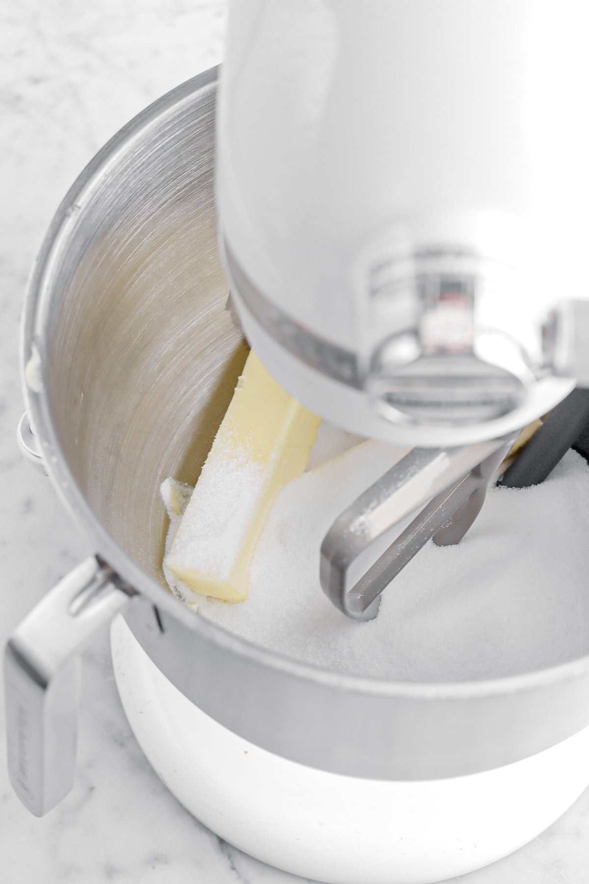 butter and sugar in stand mixer.