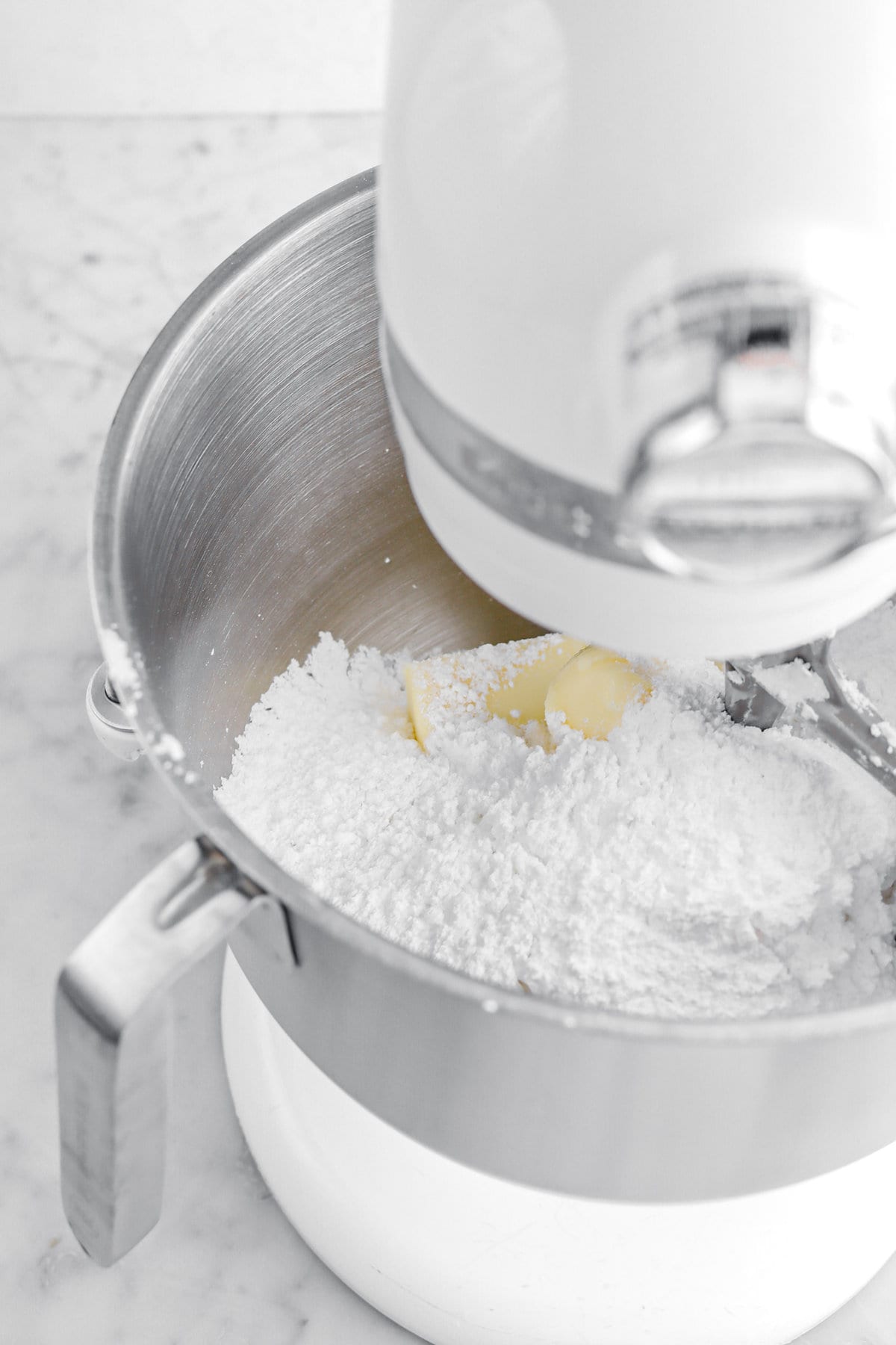 powdered sugar and butter in stand mixer.