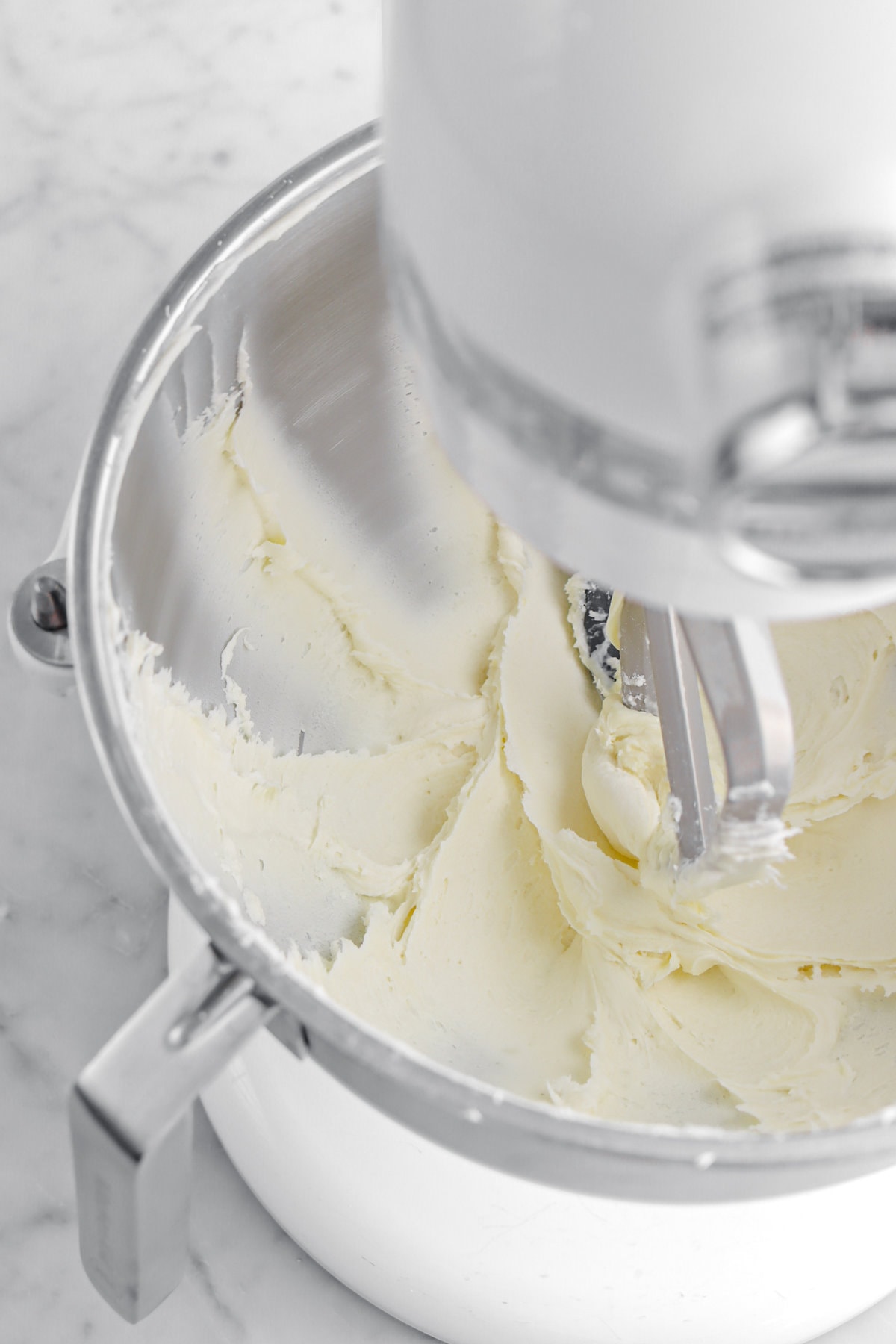 white chocolate buttercream in stand mixer.