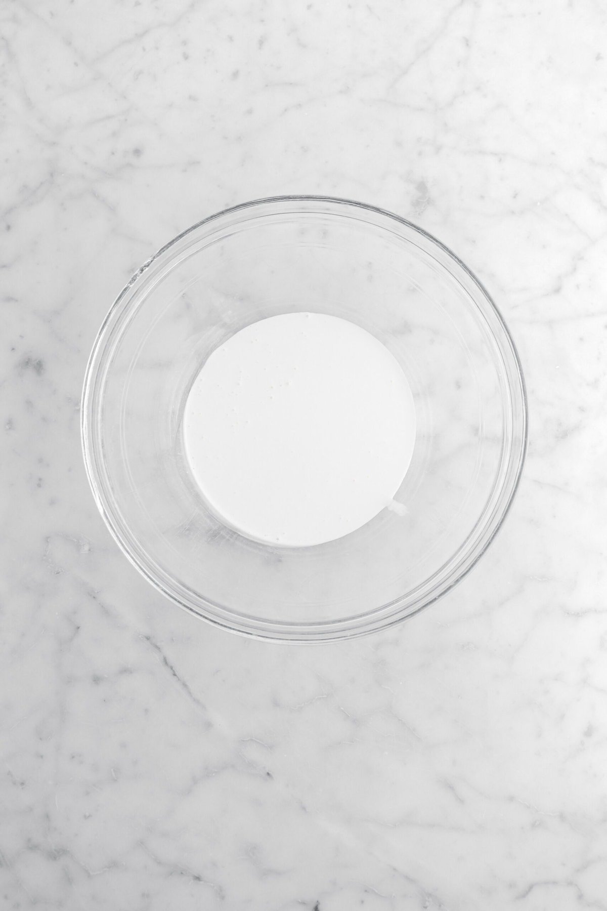 cream in glass bowl.
