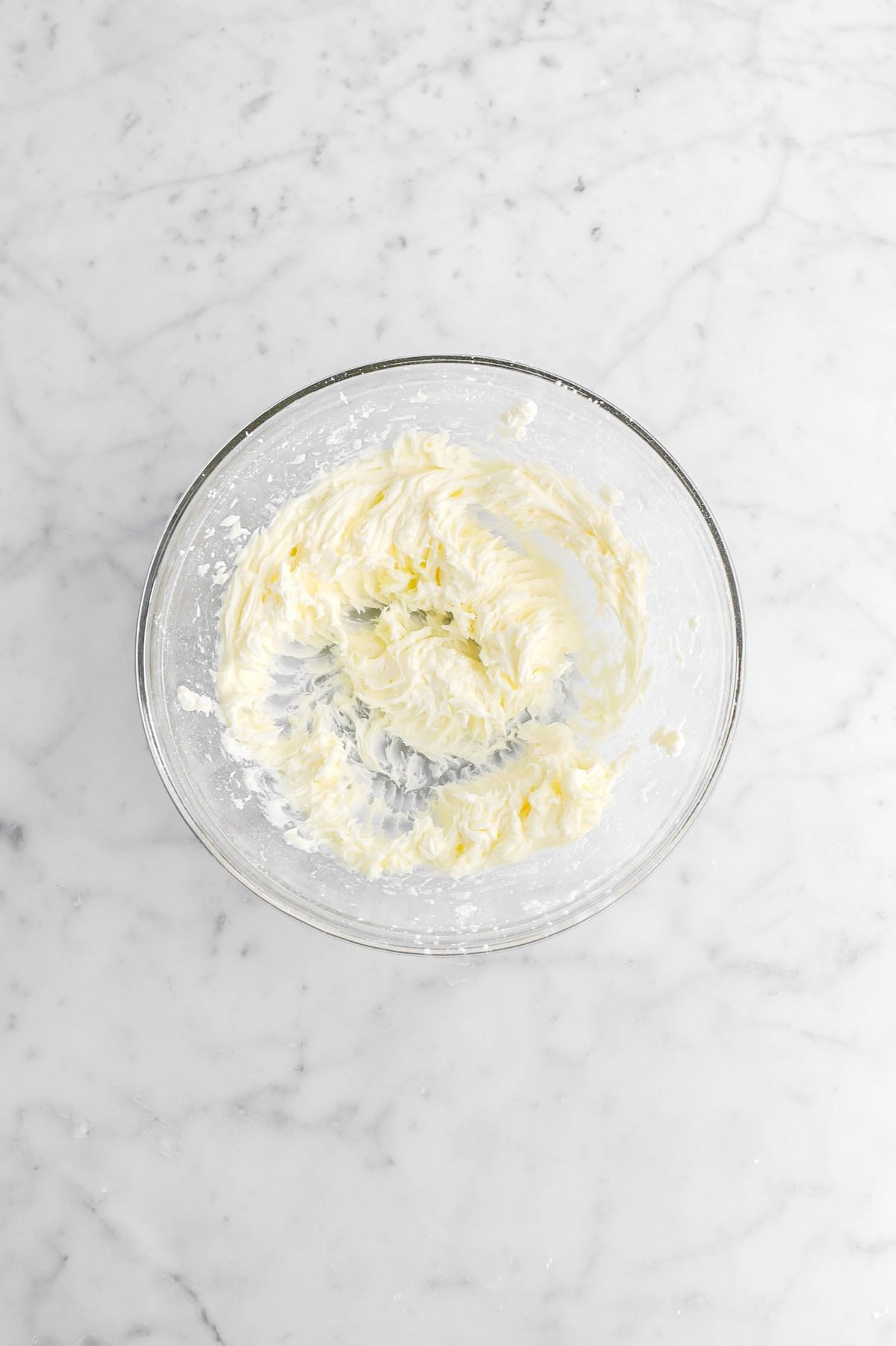 creamed butter in glass bowl.