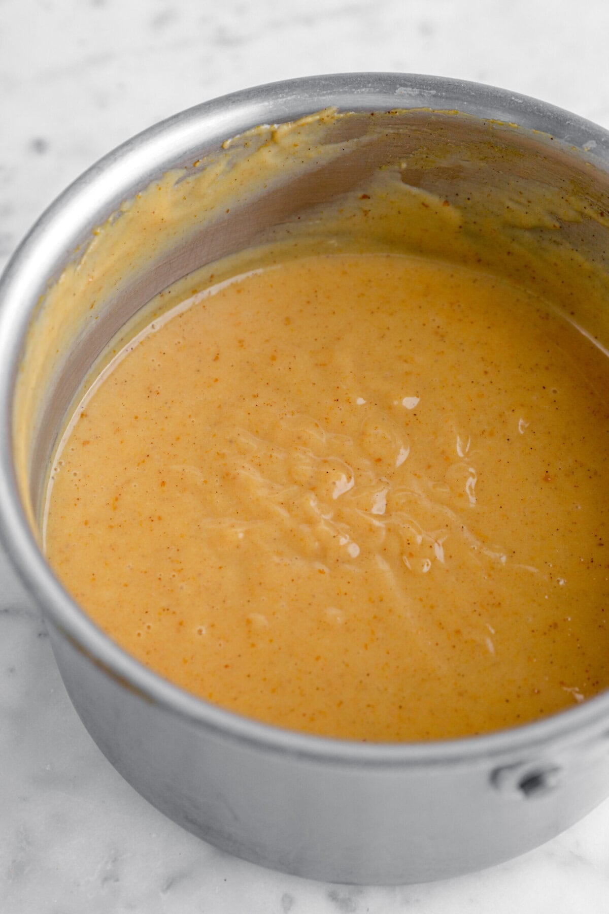 pumpkin pudding in small pot.