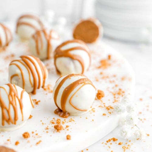 biscoff truffles on marble surface.