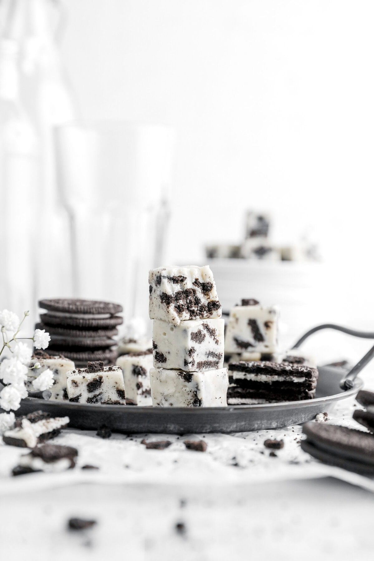 stacked oreo fudge with bite missing from top piece.