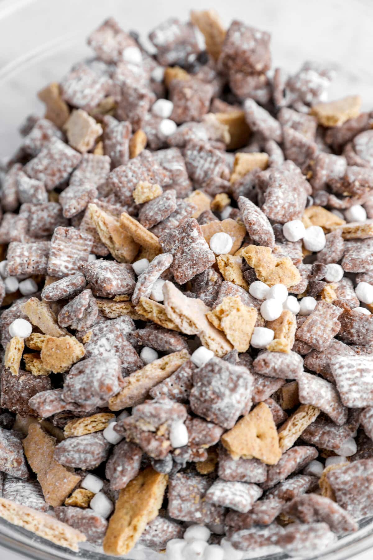 s'mores muddy buddies in glass bowl.